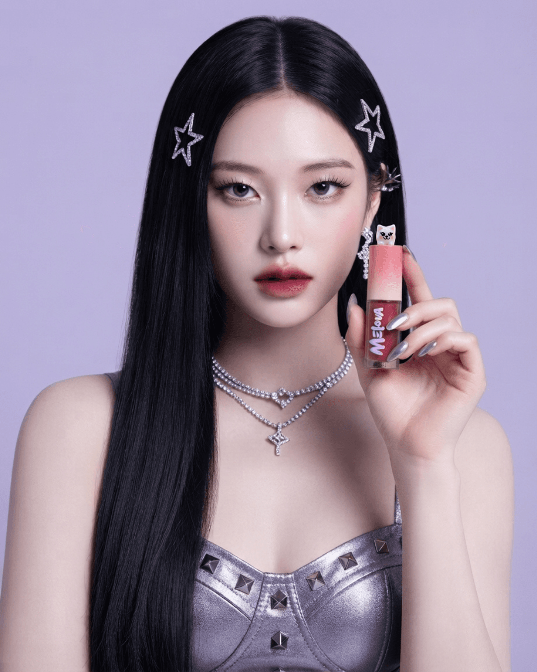 Model wearing Melova Pink Whisper lip tint